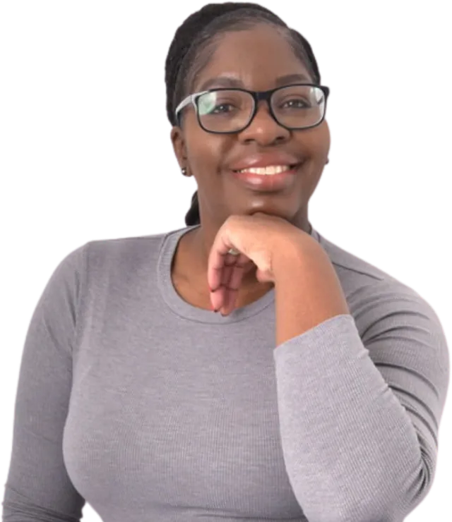 Judy Harrison, founder of Therawake, smiling, resting her chin on her hand